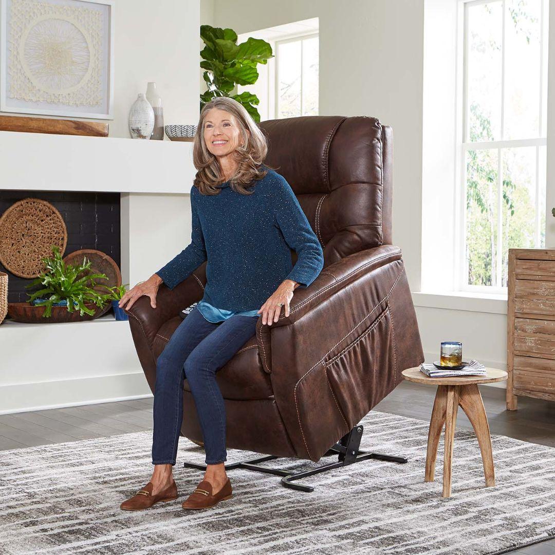 Woman sitting in a Golden Technologies PR-446 Dione Infinite Position Lift Chair Recliner 
