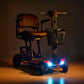 Buzzaround CarryOn Scooter by Golden Technologies with visible lights on a dark background