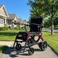 Monarch Mobility Ezi Fold Carbon Folding Power Wheelchair on Sidewalk