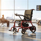 Monarch Mobility Flyer Power Wheelchair in Red in Airport