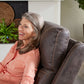 Woman sitting in a Golden Technologies Cloud PR448 Titan Maxicomfort with plants and decor in the background