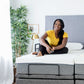 Woman Sitting on Golden Passport Hi Low Adjustable Bed 