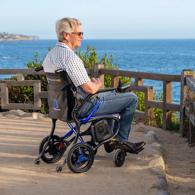 Man looking at ocean in Forcemech Ultralite G20 Power Chair