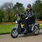 Senior Man Riding Afikim Afiscooter SE Three Wheel Recreational Mobility Scooter