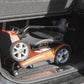 EV Rider Transport 4AF Automatic Folding Travel Mobility Scooter in Gold in trunk of a car.